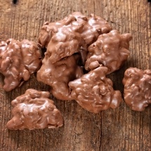 Chocolate covered pecan carmel clusters